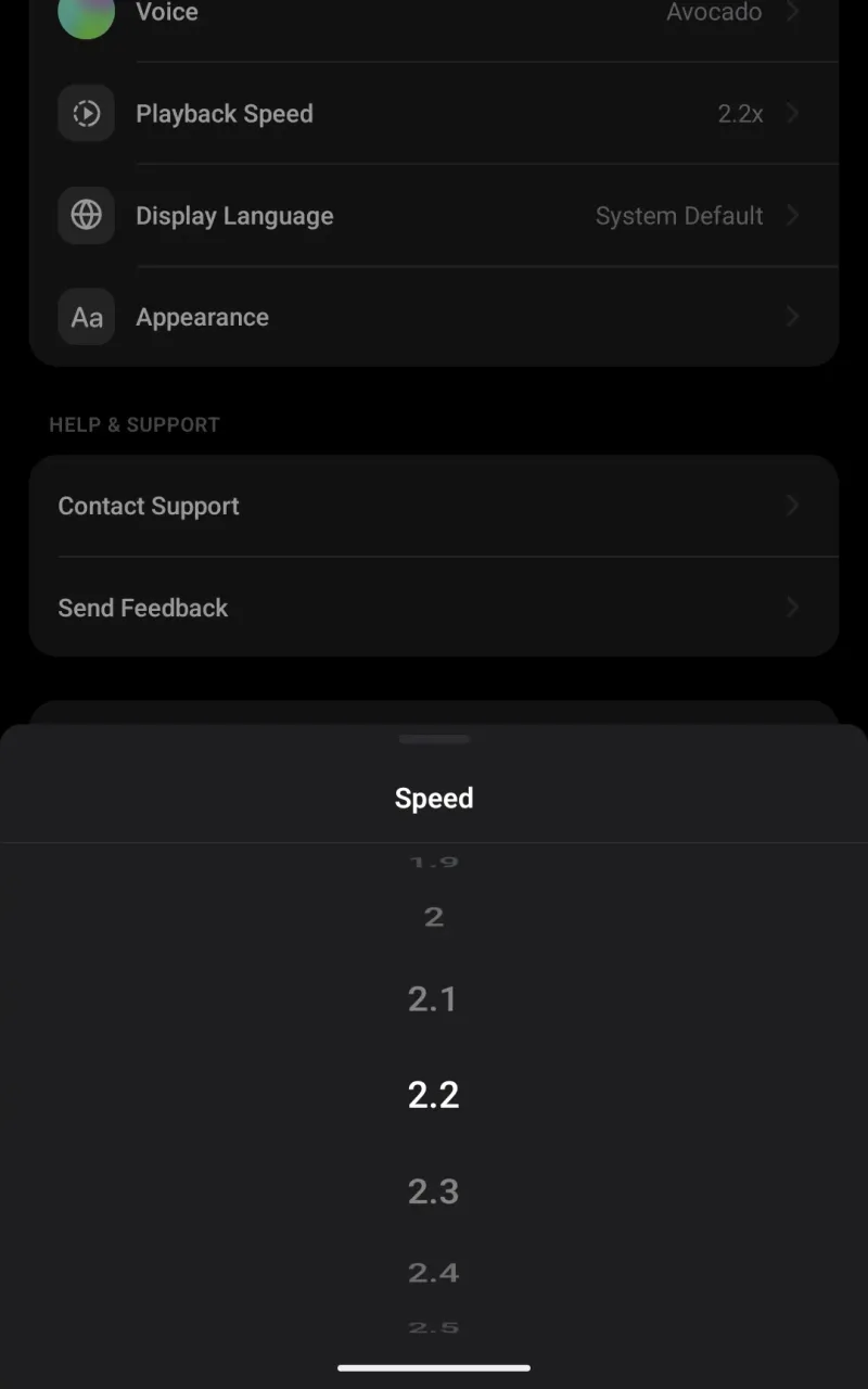Swiping the vertical scroll wheel picker in the bottom sheet to adjust the mobile reading speed multiplier